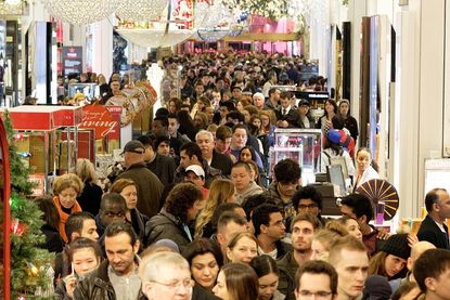 Shoppers pile into a store on Black Friday.