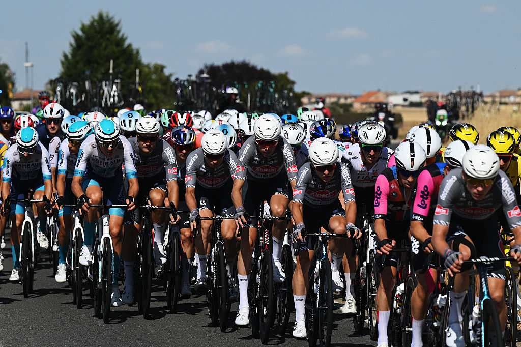GUIJUELO, SPAIN - SEPTEMBER 12: (L-R) Jasper Philipsen of Belgium, Oscar Rieseek of Netherlands and Team Alpecin - Deceuninck, Mikkel Bjerg of Denmark and UAE Team Emirates - XRG and a general view of the peloton competing during the La Vuelta - 80th Tour of Spain 2025, Stage 19 a 161.9km stage from Rueda to Guijuelo / #UCIWT / on September 12, 2025 in Guijuelo, Spain. (Photo by Dario Belingheri/Getty Images)