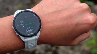 Garmin Forerunner 165 being tested by our reviewer