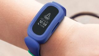 best fitbit Fitbit Ace 3 with blue band on person's wrist