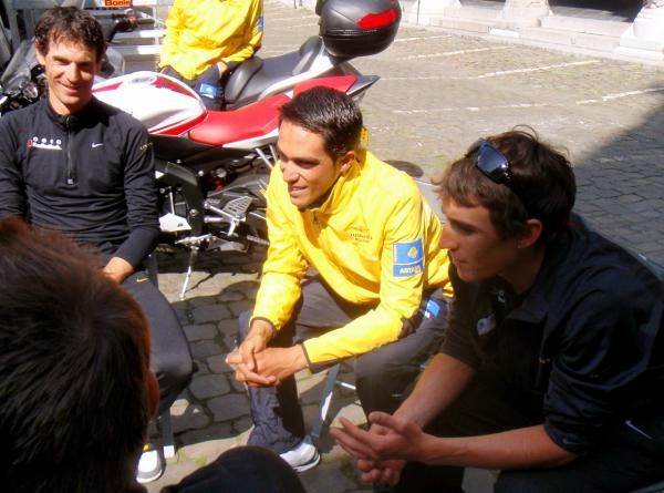 Alberto Contador (Astana) catches up with former-teammate Andreas Kloden. Matthew Busche (right, RadioShack)