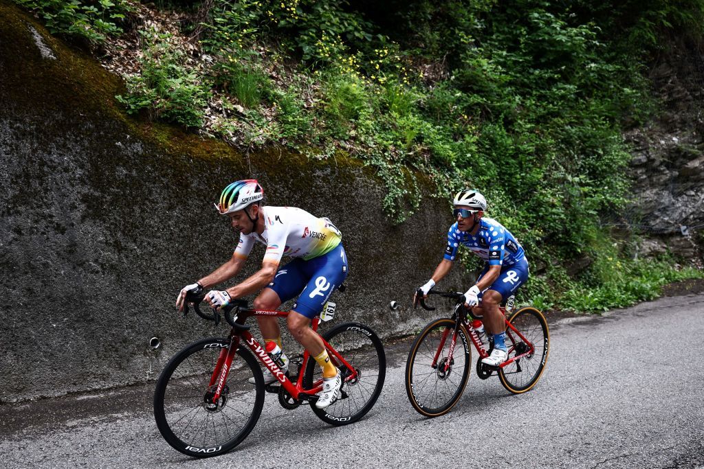 TotalEnergies French rider Pierre Latour L and dot jersey of overall best climber TotalEnergies French rider Mathieu Burgaudeau ride during the seventh stage of the 75th edition of the Criterium du Dauphine cycling race 148km between Port de Savoie to Col de la Croix de Fer Saint Sorlin France on June 10 2023 Photo by AnneChristine POUJOULAT AFP Photo by ANNECHRISTINE POUJOULATAFP via Getty Images
