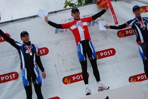Rasmus Christian Quaade (Team Designa K&oslash;kken) celebrates in the Danish U23 champion's jersey.