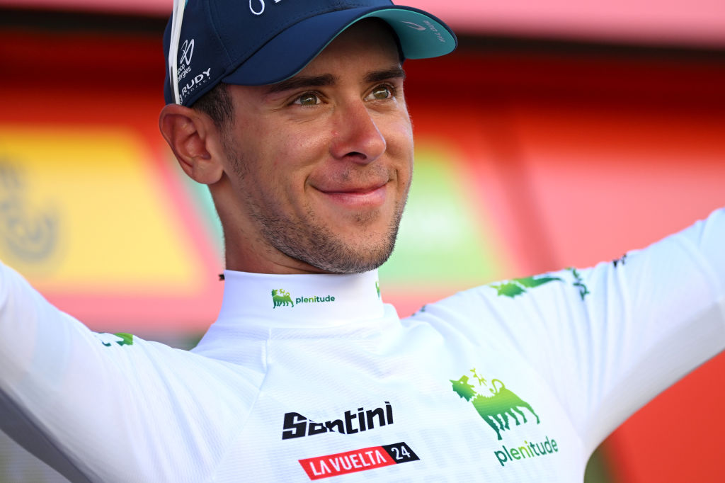 SEVILLE SPAIN AUGUST 21 Antonio Tiberi of Italy and Team Bahrain Victorious White Best Young Rider Jersey celebrates at podium after La Vuelta 79th Tour of Spain 2024 Stage 5 a 177km stage Fuente del Maestre to Seville UCIWT on August 21 2024 in Seville Spain Photo by Dario BelingheriGetty Images