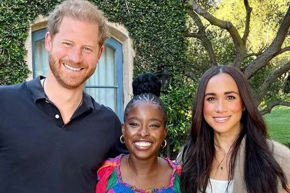 Harry, Meghan and Amanda posed together for a snap, with Meghan's emerald necklace capturing people's attention
