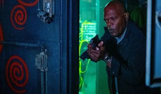 Spiral: From The Book of Saw Samuel L. Jackson enters a room, gun drawn