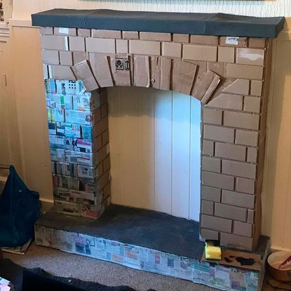 This DIY cardboard fireplace idea is really thinking outside the box ...