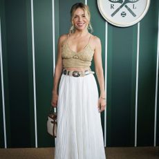  Sienna Miller, wearing Ralph Lauren, attends the Ralph Lauren Suite during The Championships, Wimbledon at All England Lawn Tennis and Croquet Club on July 13, 2025 in London, England