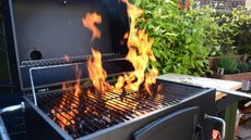 barbecue grill in the garden with flames