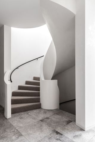 Sculptural staircase at Armadale Residence in Australia