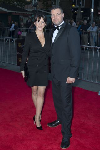 Eve Myles on the red carpet with her husband Bradley Freegard