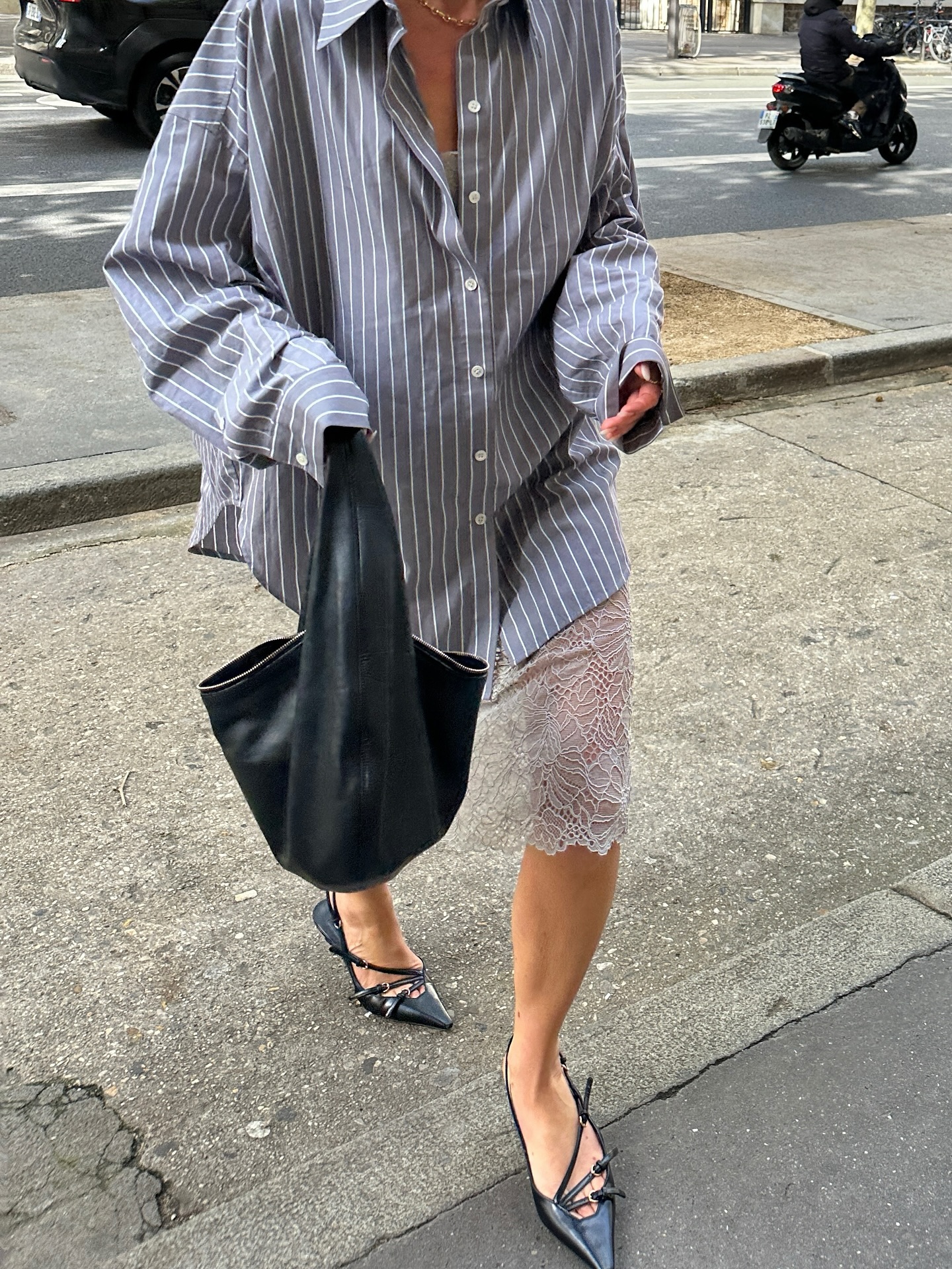 Jeanette Madsen wears a Shirt + Lace Skirt + Slingbacks