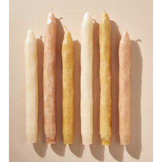 six taper candles with a whittled texture