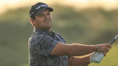 Patrick Reed hits an iron shot