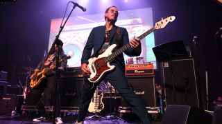 Musician Scott Shriner of the band Weezer performs onstage during Charity Bomb Presents Strange 80's 3D benefit concert at The Fonda Theatre on June 01, 2019 in Los Angeles, California.