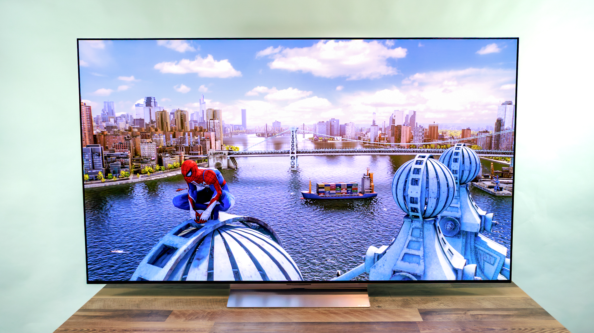 LG C6 OLED TV shown on a wood table