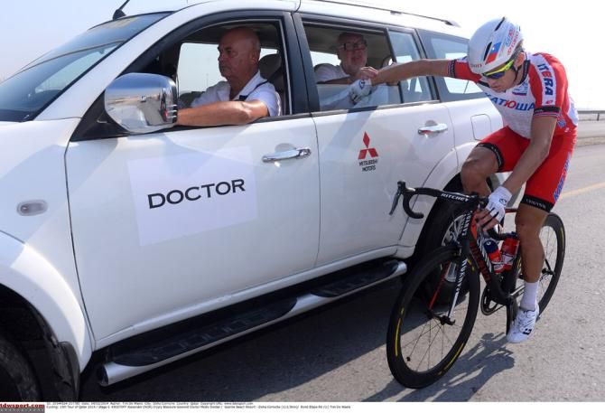 Alexander Kristoff gets some medical attention after his crash