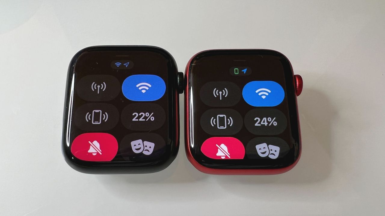 An Apple Watch 7 (45mm) on the left and an Apple Watch 6 (44mm) on the right