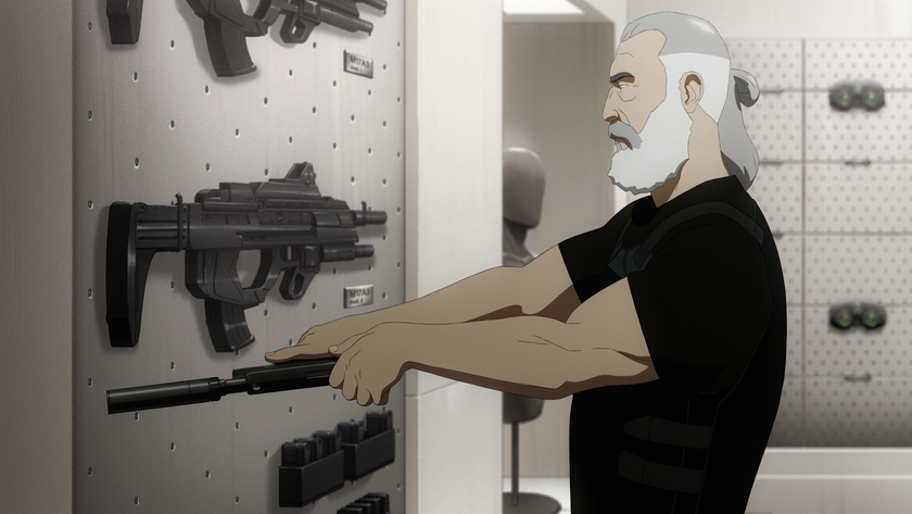 A bearded Sam Fisher loads a silenced pistol.