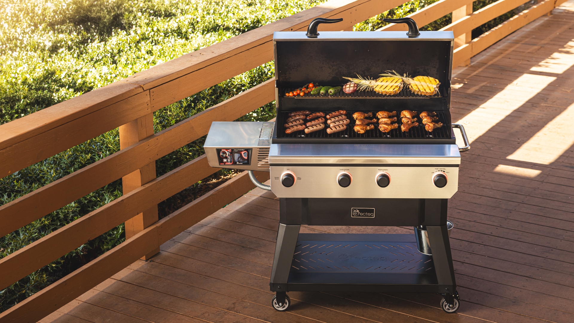 A wide shot of the Recteq X-Fire Pro cooking food