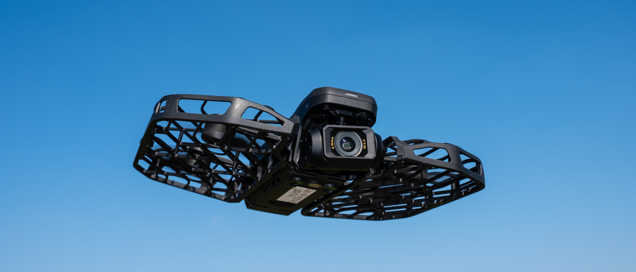 HoverAir X1 PROMAX in flight against a blue sky