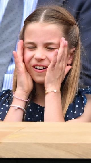 Princess Charlotte puts her hands to her face as she watches the men's final on day fourteen of the Wimbledon Tennis Championships 2024