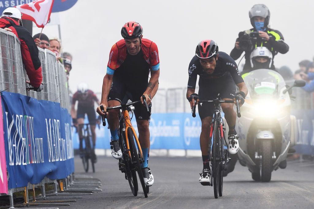 MONTE ZONCOLAN ITALY MAY 22 Damiano Caruso of Italy and Team Bahrain Victorious Daniel Felipe Martinez Poveda of Colombia and Team INEOS Grenadiers at arrival during the 104th Giro dItalia 2021 Stage 14 a 205km stage from Cittadella to Monte Zoncolan 1730m UCIworldtour girodiitalia Giro on May 22 2021 in Monte Zoncolan Italy Photo by Tim de WaeleGetty Images