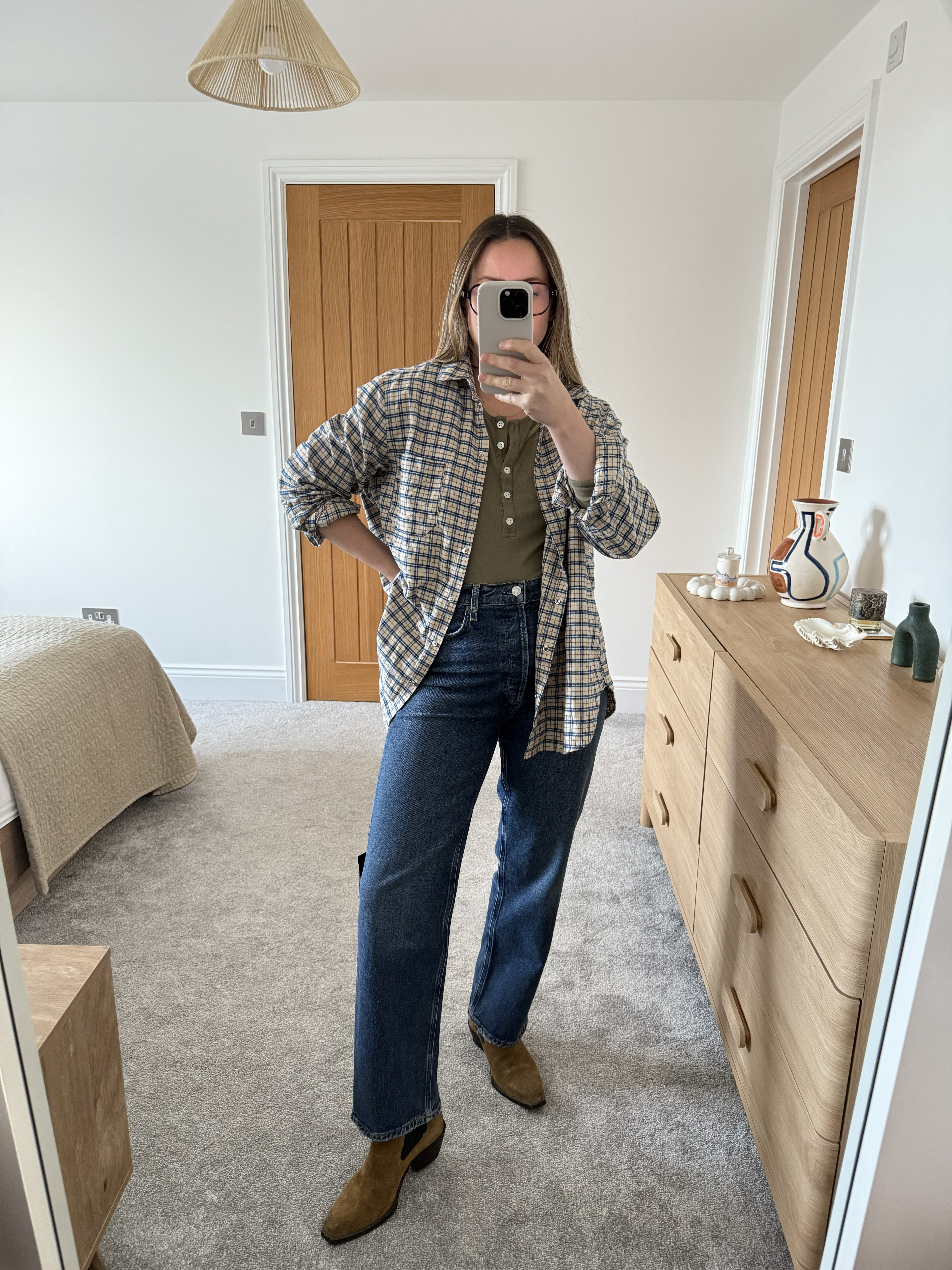 Stylist Emily Dawes wears Agolde 90s Pinch Waist Straight Leg Jeans
