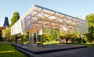 Pavilion with mirrored walls and wooden framed roof