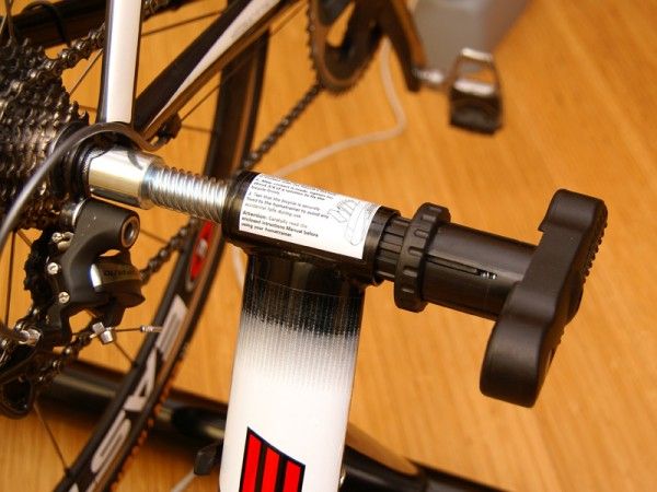 The single-sided axle mount is easy to use and locks securely in place though it flexes more than we'd like