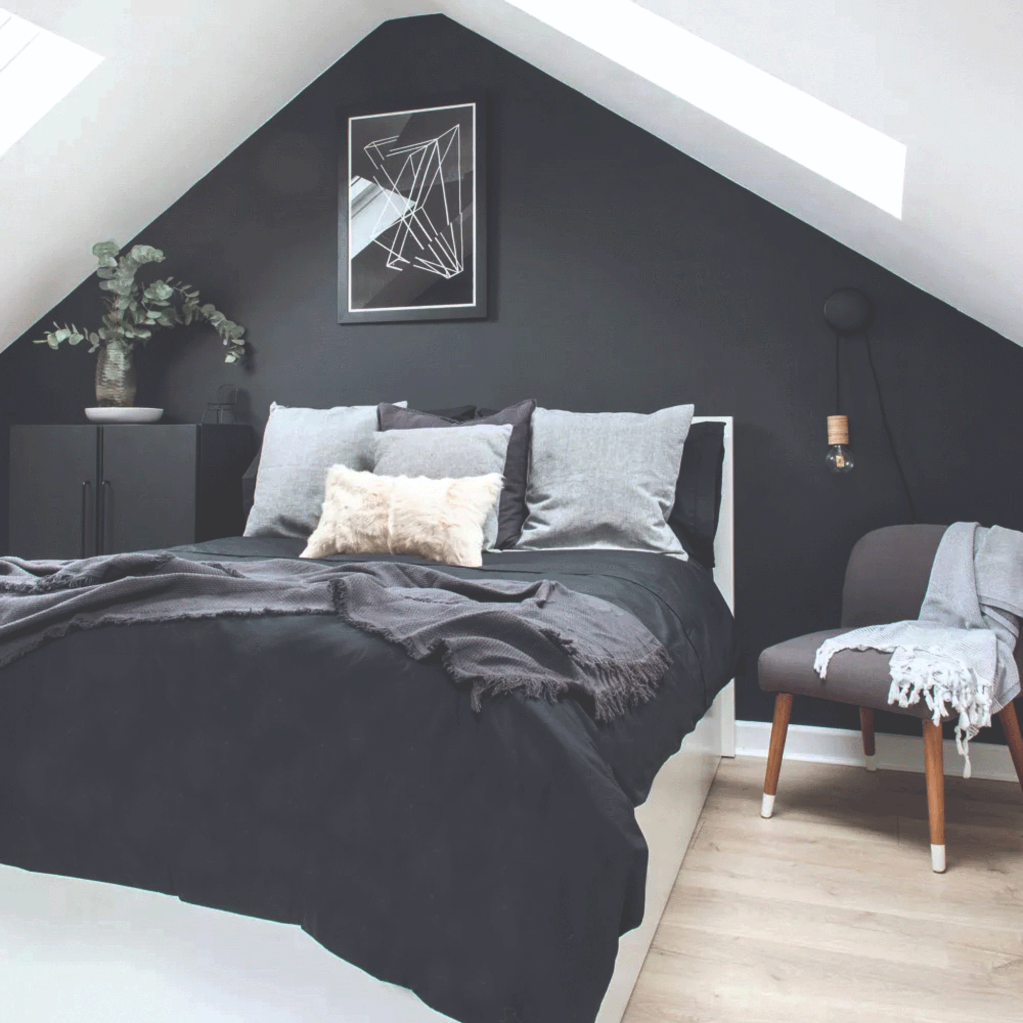 Grey bedroom with armchair