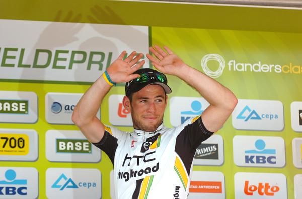 Mark Cavendish (HTC-Highroad) waves from the podium