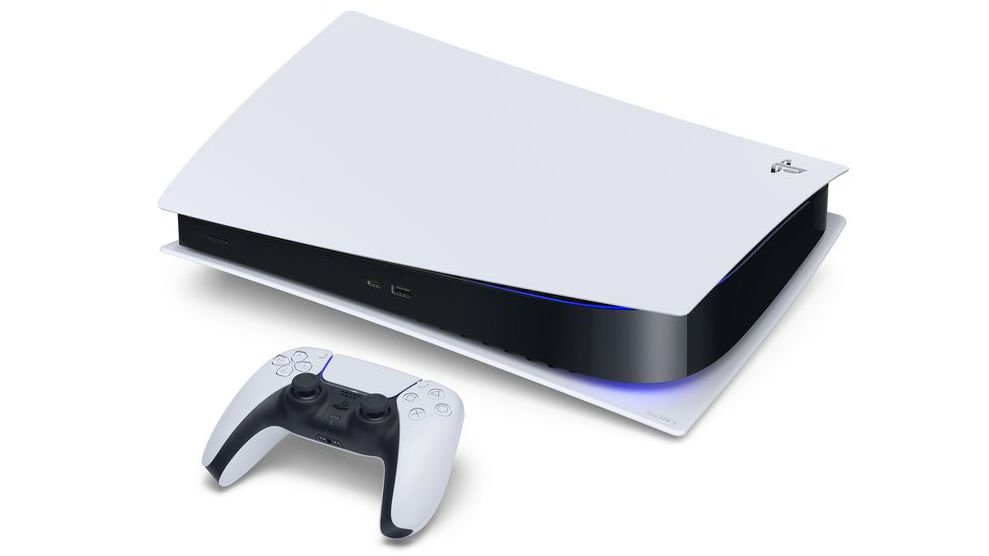A PS5 and DualSense controller lying on a white background