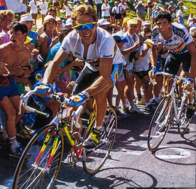 Greg LeMond climbs ahead of Miguel Indurain at the 1990 Tour de France. LeMond would win his third and final Tour in 1990 while Indurain would win five straight from 1991 to 1995.