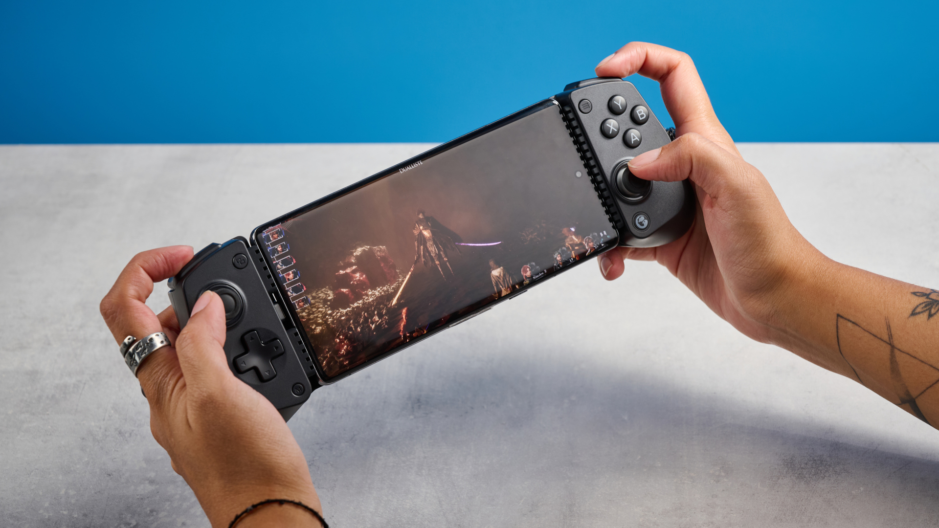 A black GameSir X5 Lite mobile gaming controller