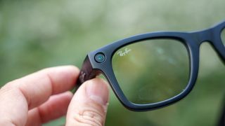 A close-up of a camera lens on the Meta Ray-Ban (gen 2) smart glasses with shutter open