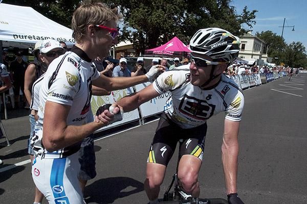 Cheers mate: Wes Sulzberger (left) congratulates his E3/Pure Tasmania teammate and close friend Matt Goss after Goss took out the final stage and the overall series in Williamstown.