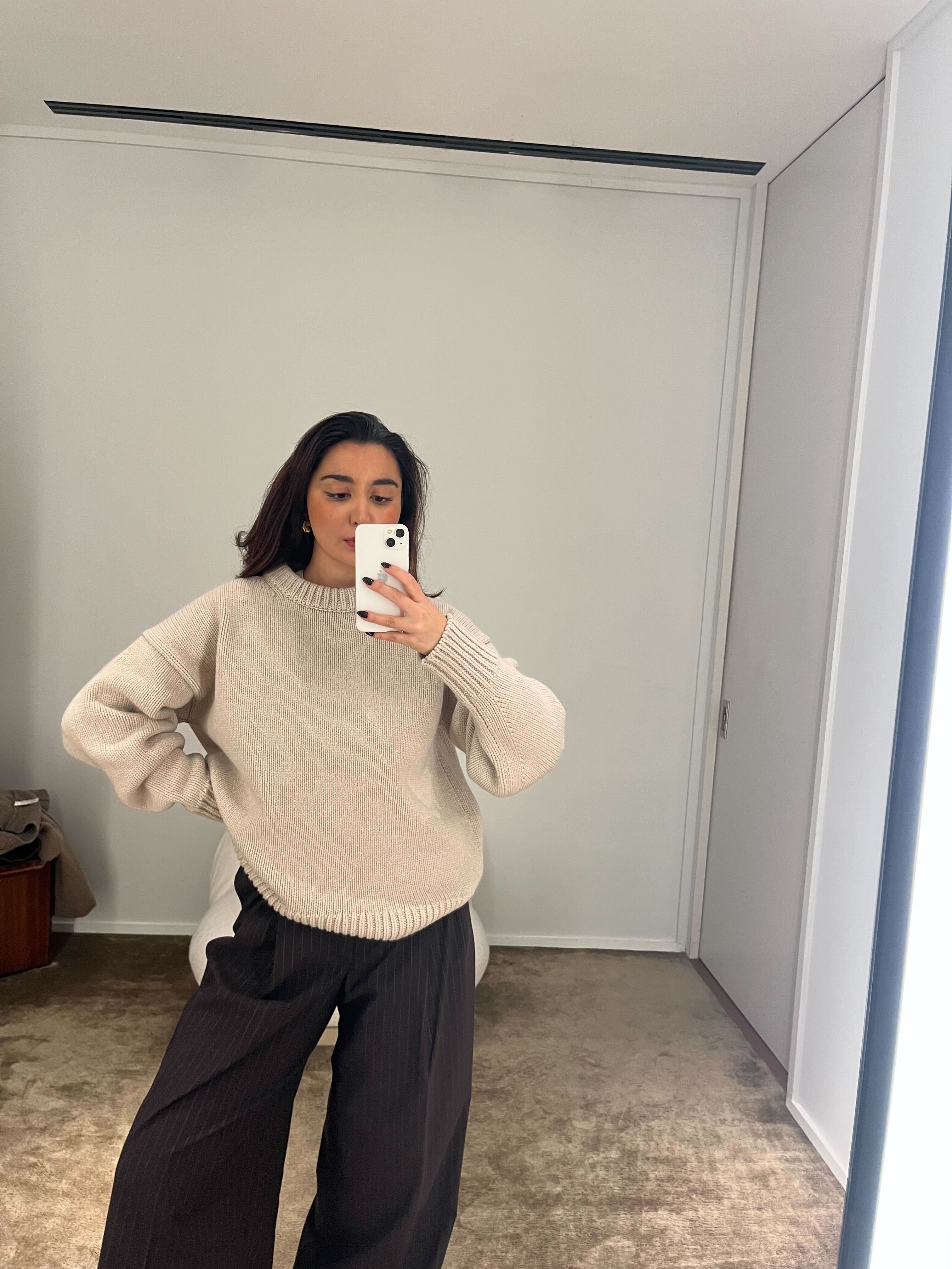 Shopping Editor Marina wearing the cream Ophelia jumper from The Row