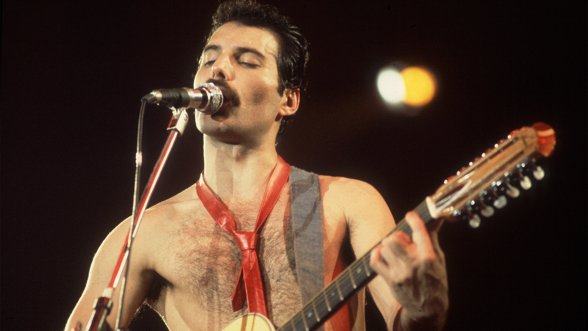 Singer Freddie Mercury (1946 - 1991) of Queen performs on stage at the Rosemont Horizon in Rosemont, Illinois, September 19, 1980.