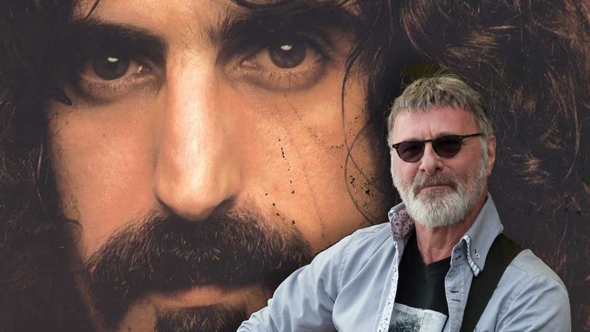 Steve Harley in front of the cover art of Frank Zappa&#039;s Apostrophe album