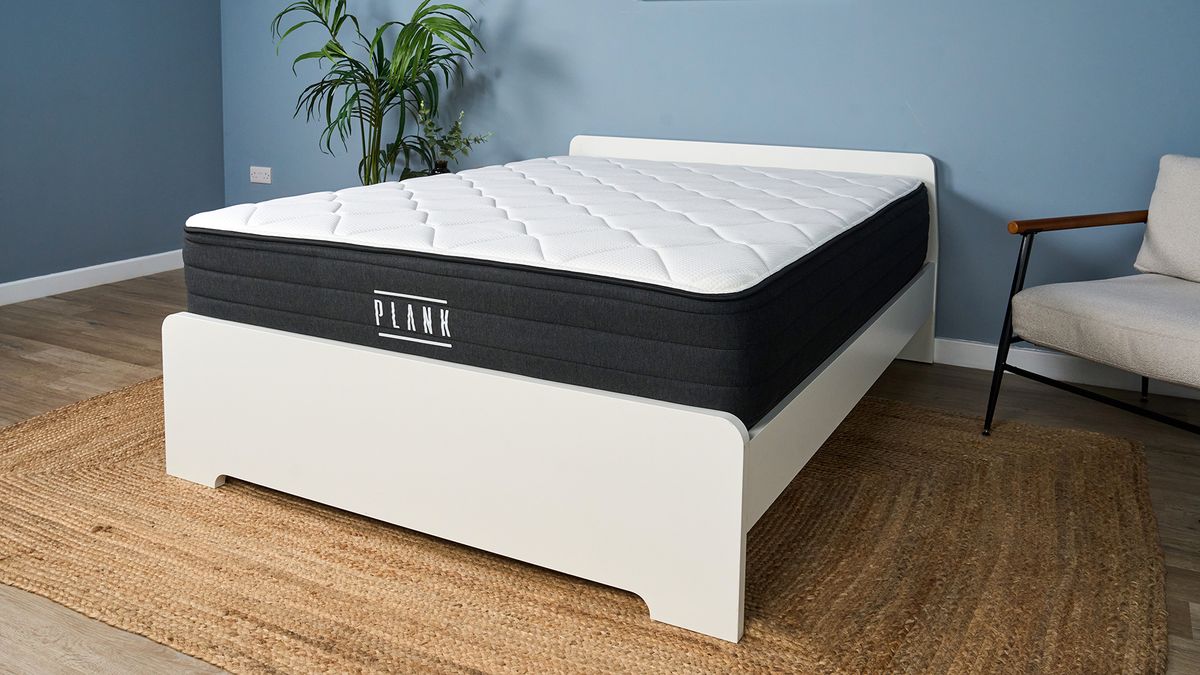 The Plank Firm Luxe mattress on a bed frame in our Sleep Lab, with the Extra Firm side facing upwards