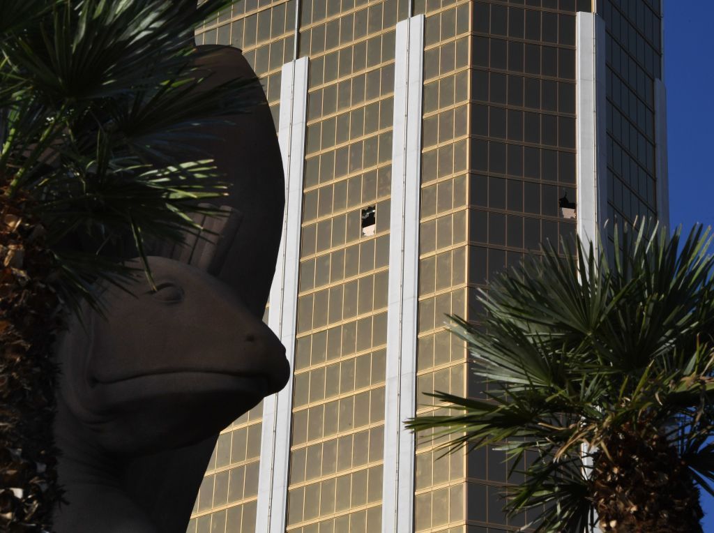 The broken windows in the Mandalay Hotel on the Las Vegas Strip, where a gunman fired from are seen on October 4, 2017 on the Las Vegas Strip, after a gunman killed 58 people and wounded more