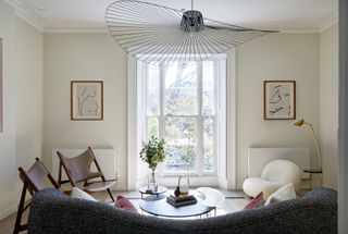 White living room with grey sofa