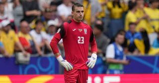 Andriy Lunin (23) of Ukraine reacts after losing against Romania during the 2024 European Football Championship (EURO 2024) Group E football match between Romania and Ukraine at Allianz Arena in Munich, Germany on June 17, 2024