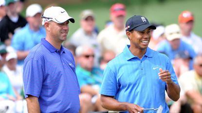 Stewart Cink and Tiger Woods smile