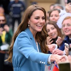 Princess Kate shaking hands with fans 