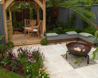 small garden with gazebo and fire pit
