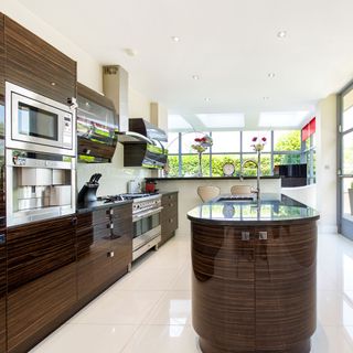 kitchen room with white roof top and cabinets with granite worktops