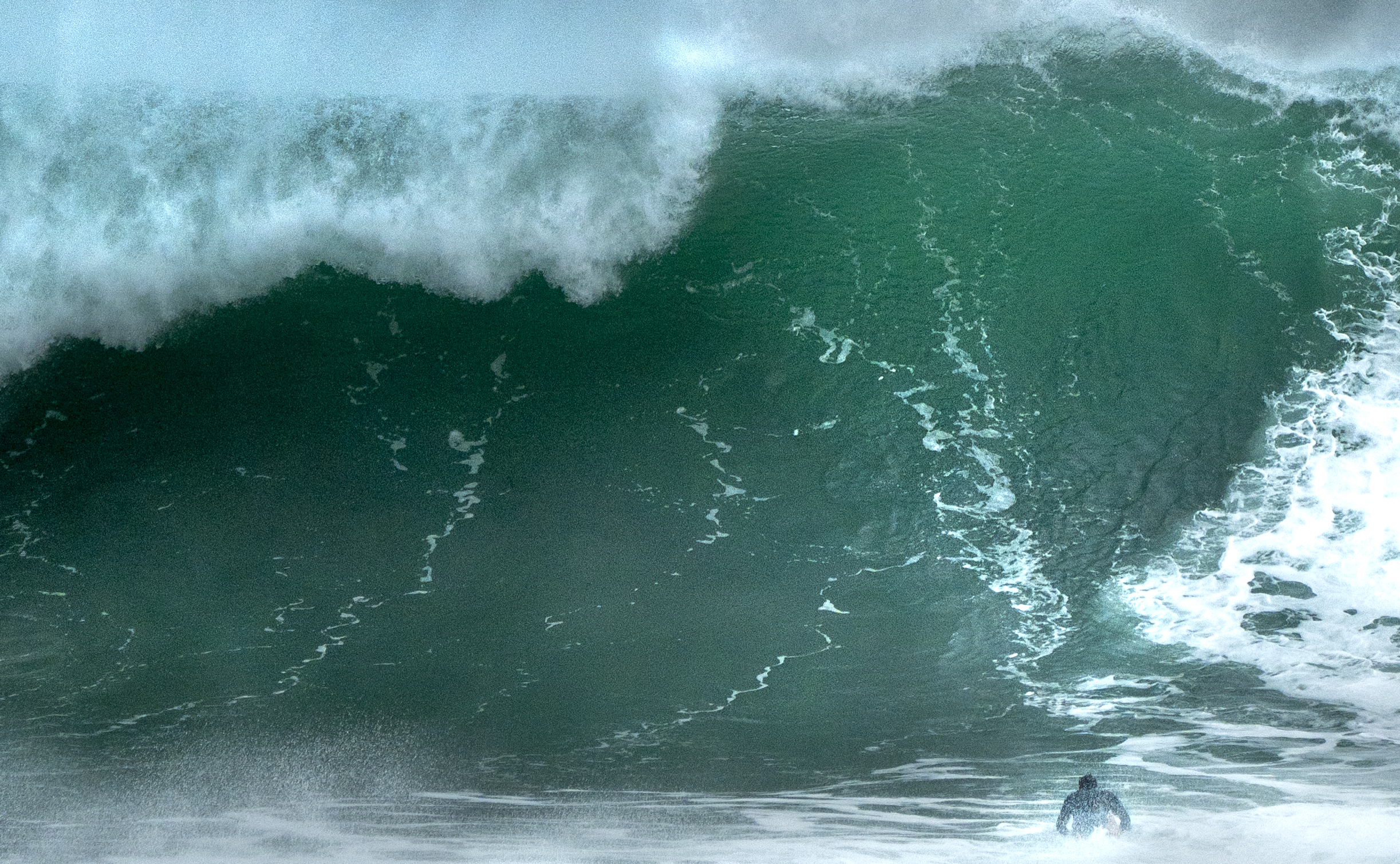 Tom Butler surfing Cribbar