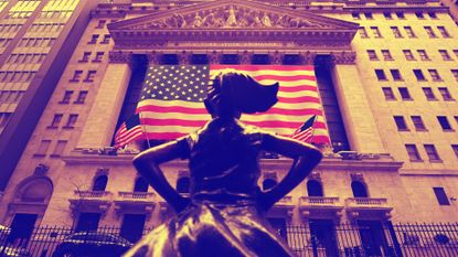 Fearless Girl statue facing the Wall Street Bull.
